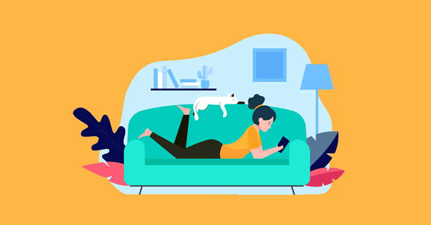 Mujer acostada en el sofá leyendo con un gato